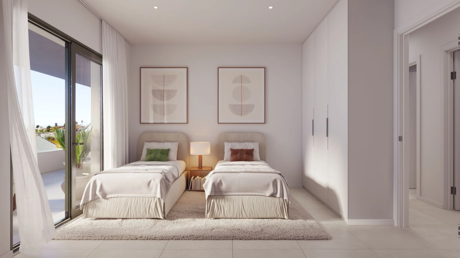 A comfortable guest bedroom designed with serene colours and ample natural light.
