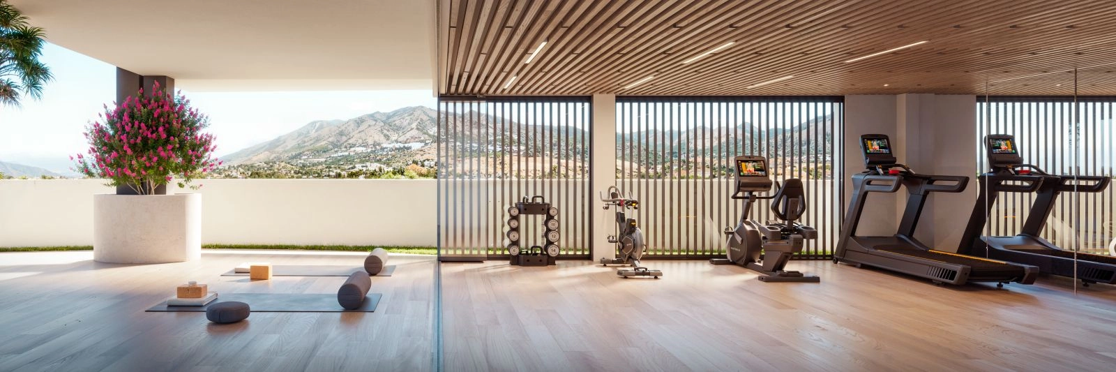 The state-of-the-art gym and wellness area offer inspiring views of the mountains.