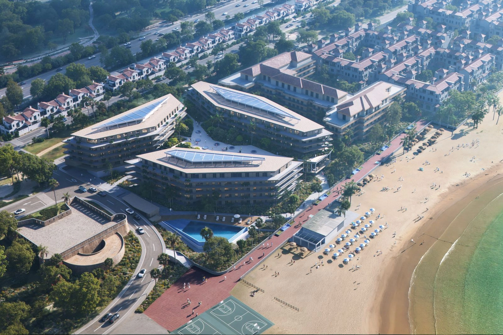 An aerial perspective showcasing the development's prime beachfront location and modern architecture.