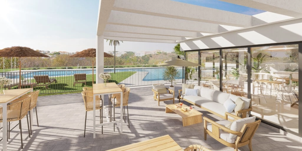 The poolside terrace and lounge area provide a perfect setting for relaxing in the Spanish sun.