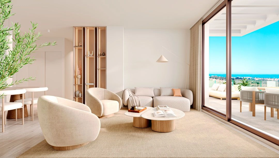 A bright and airy living room designed for comfort, opening directly onto the private terrace.