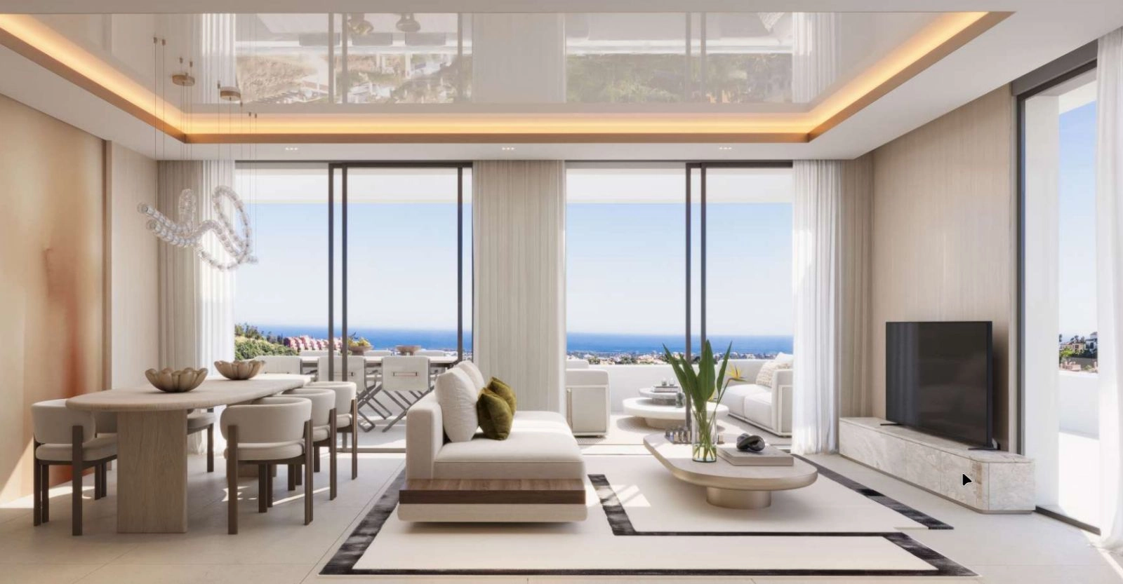 Sunlit living areas are designed with elegance, opening to stunning sea views.