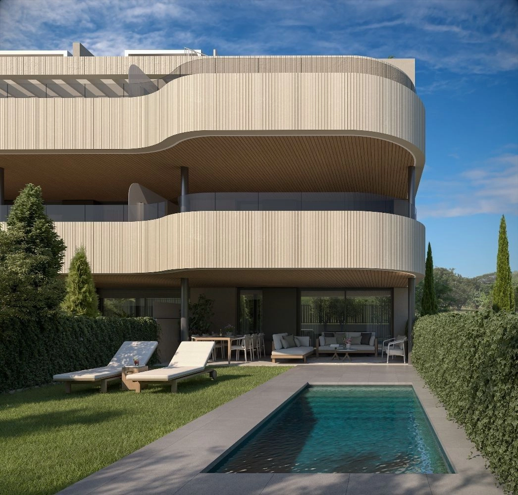 A ground-floor residence with a private garden and personal swimming pool, offering privacy and direct access to the outdoors.