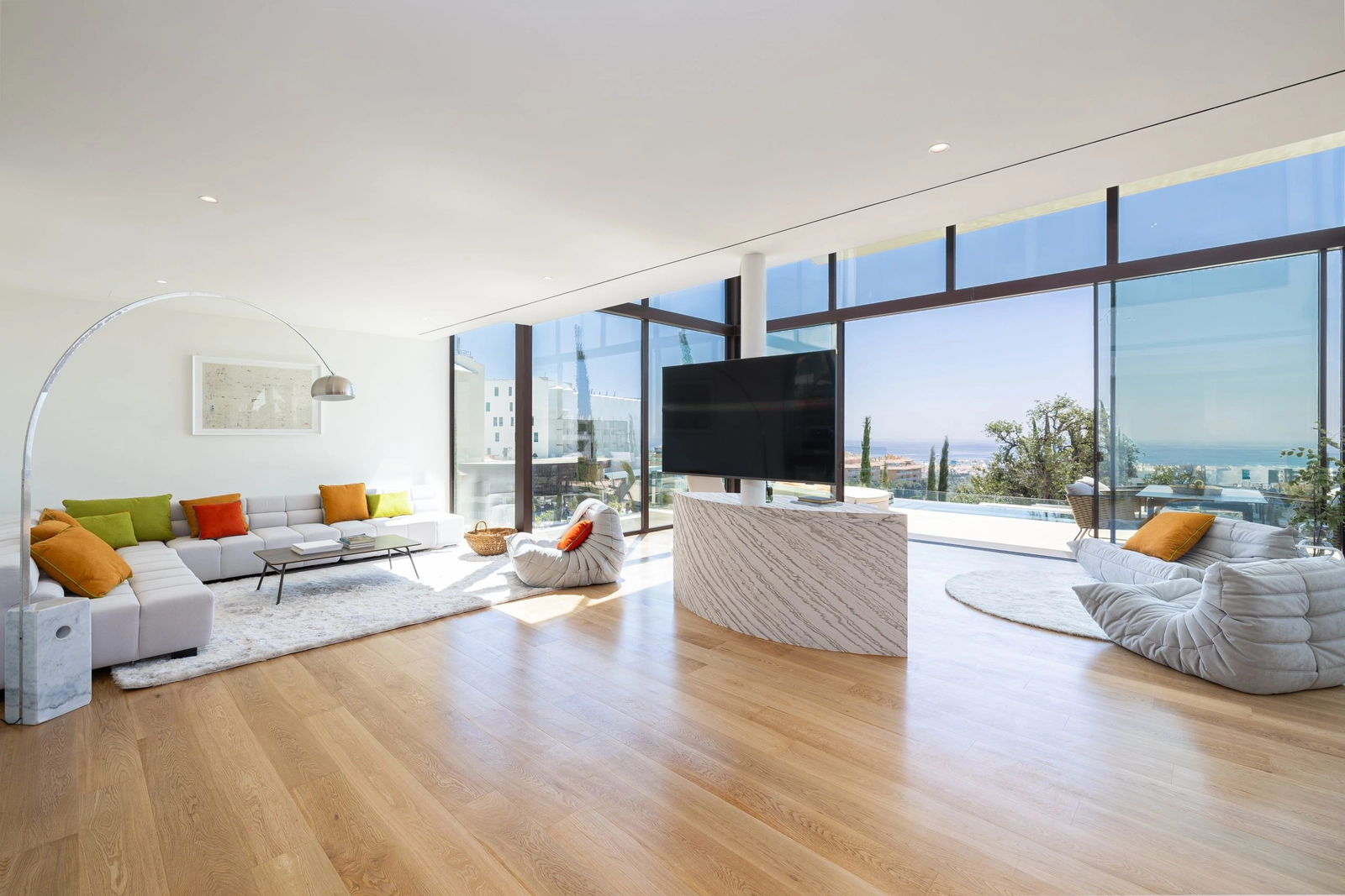 Spacious, light-filled living rooms are designed for comfort and modern luxury living.