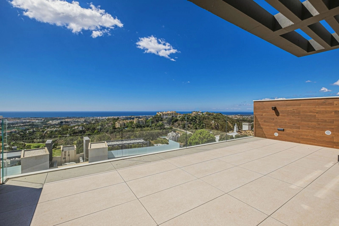 The expansive rooftop solarium is an ideal space for entertaining with spectacular sea views.