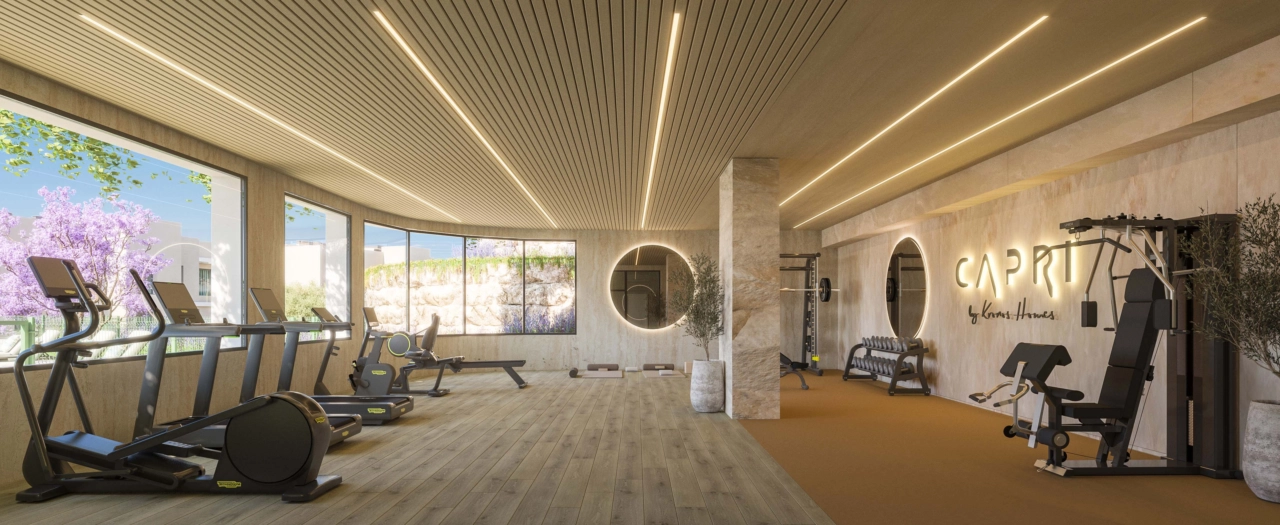 Stay active in the fully equipped gymnasium, featuring modern equipment and views of the gardens.