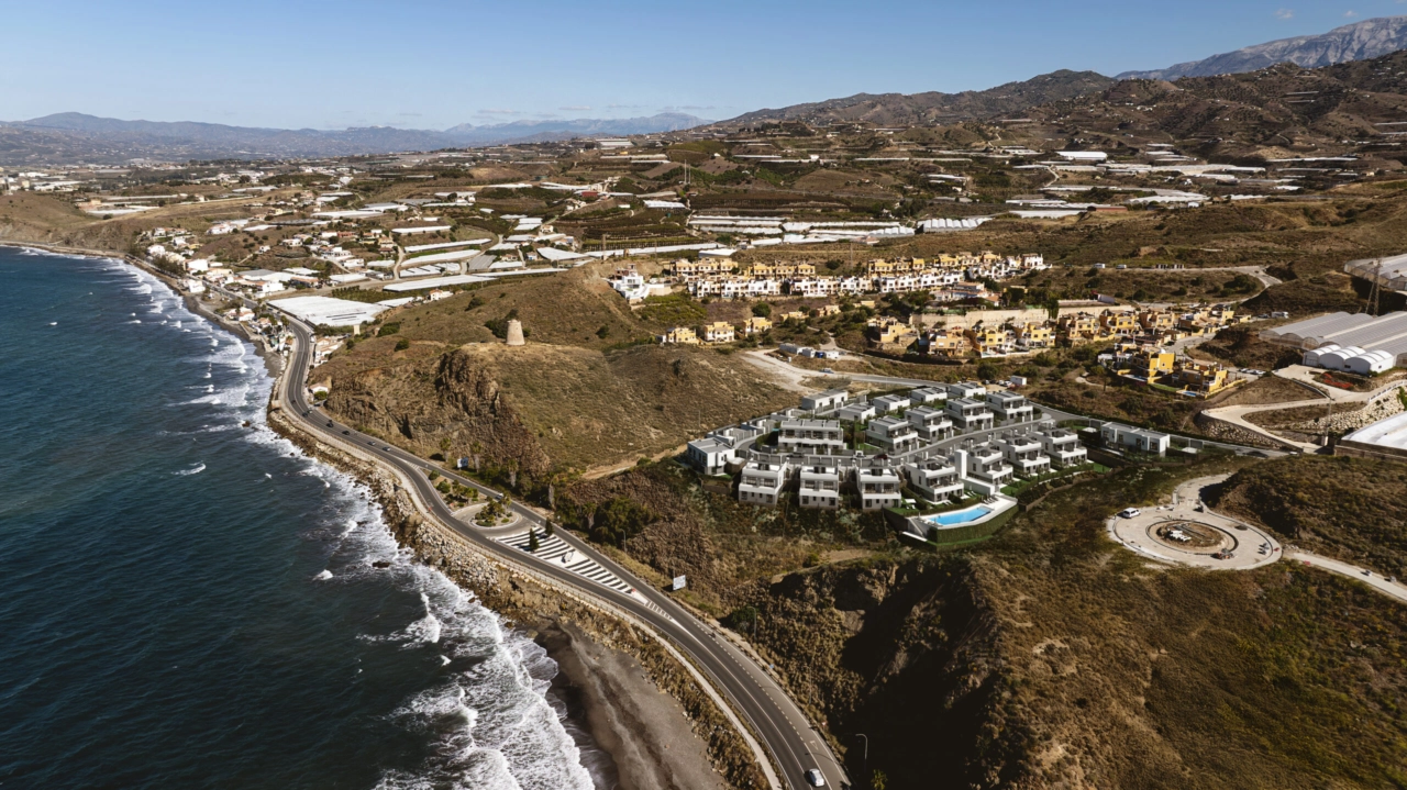 An aerial view showing the prime coastal location of this exclusive development near Velez-Malaga.