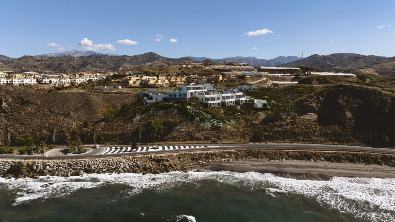 The development is perfectly integrated into the hillside, offering privacy and magnificent views.