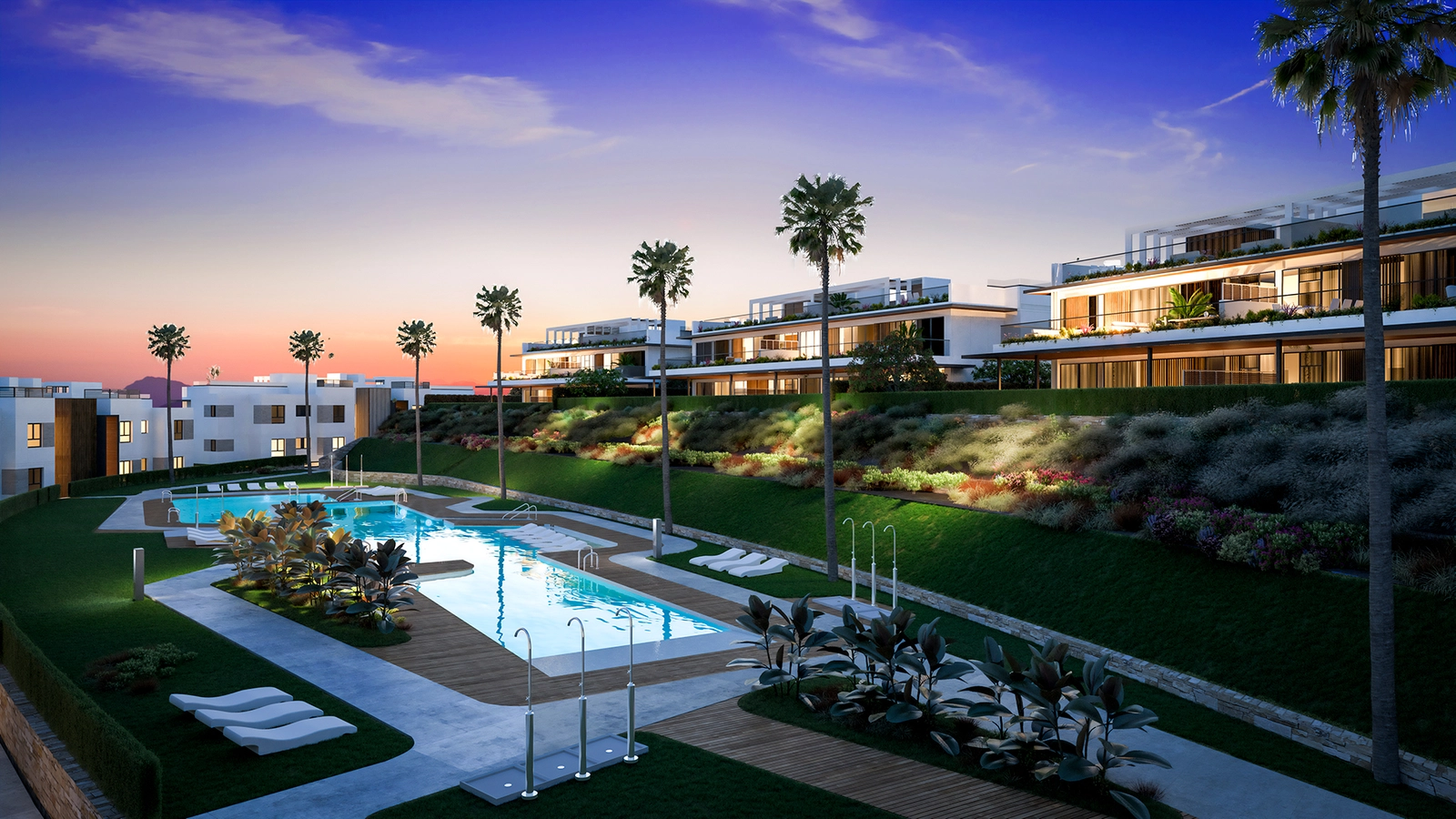 A view of the apartments and communal pool area as dusk settles over the Costa del Sol.