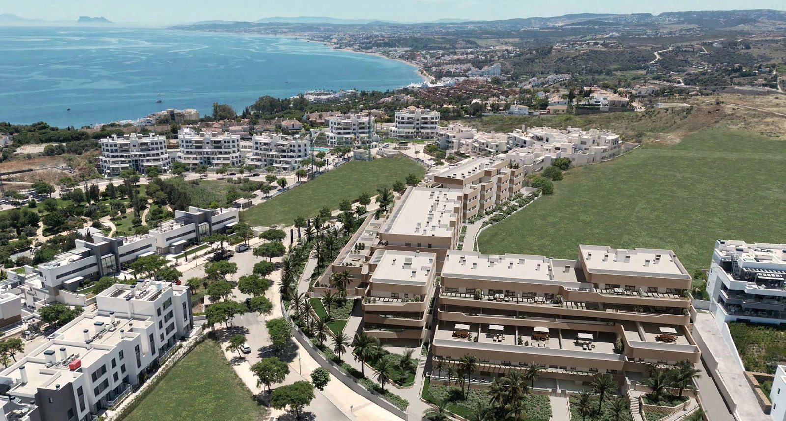 An aerial view showcasing the development's prime location on the Estepona coastline.