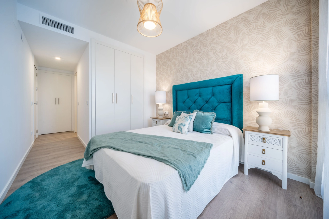 The principal bedroom offers a tranquil retreat, with elegant design and plenty of natural light.