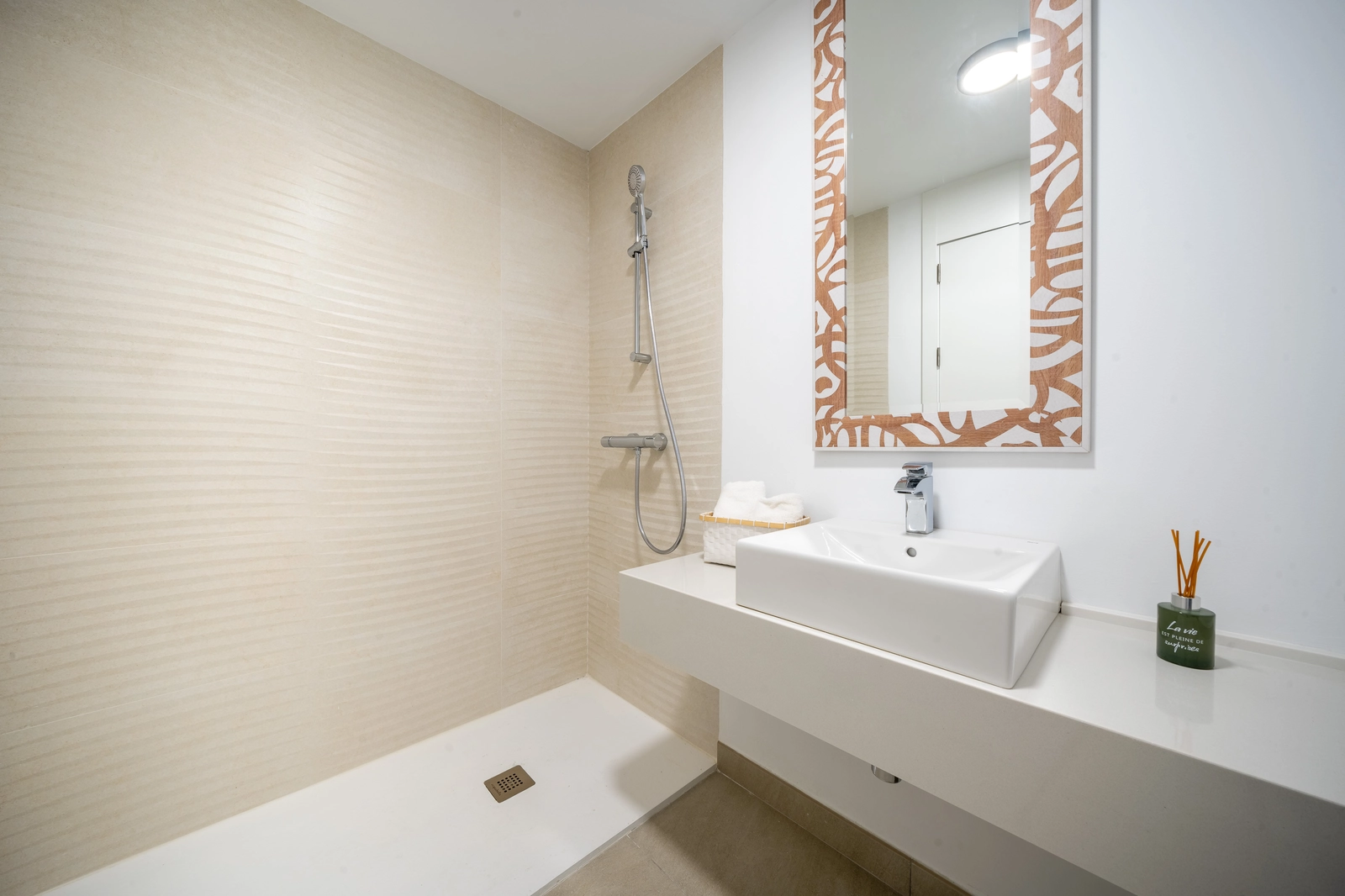The second bathroom, finished with the same high-quality materials and contemporary style.