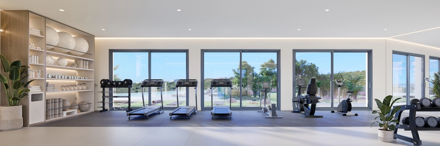 The fully equipped residents' gym, with inspiring views to enhance your workout.