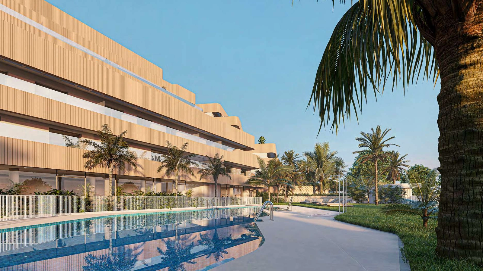 The communal swimming pool and gardens provide a peaceful setting for relaxation.