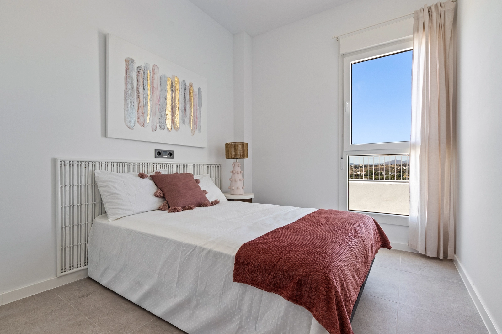 Guest bedrooms are bright and spacious, offering comfort and pleasant views for family and visitors.