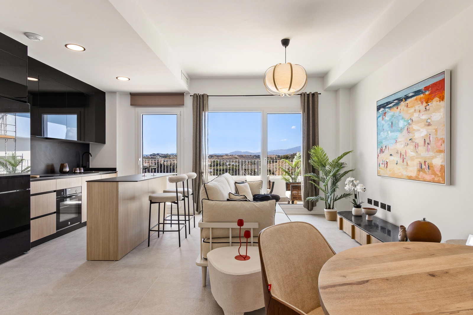 The bright and welcoming open-plan living and dining area, designed for modern comfort and style.