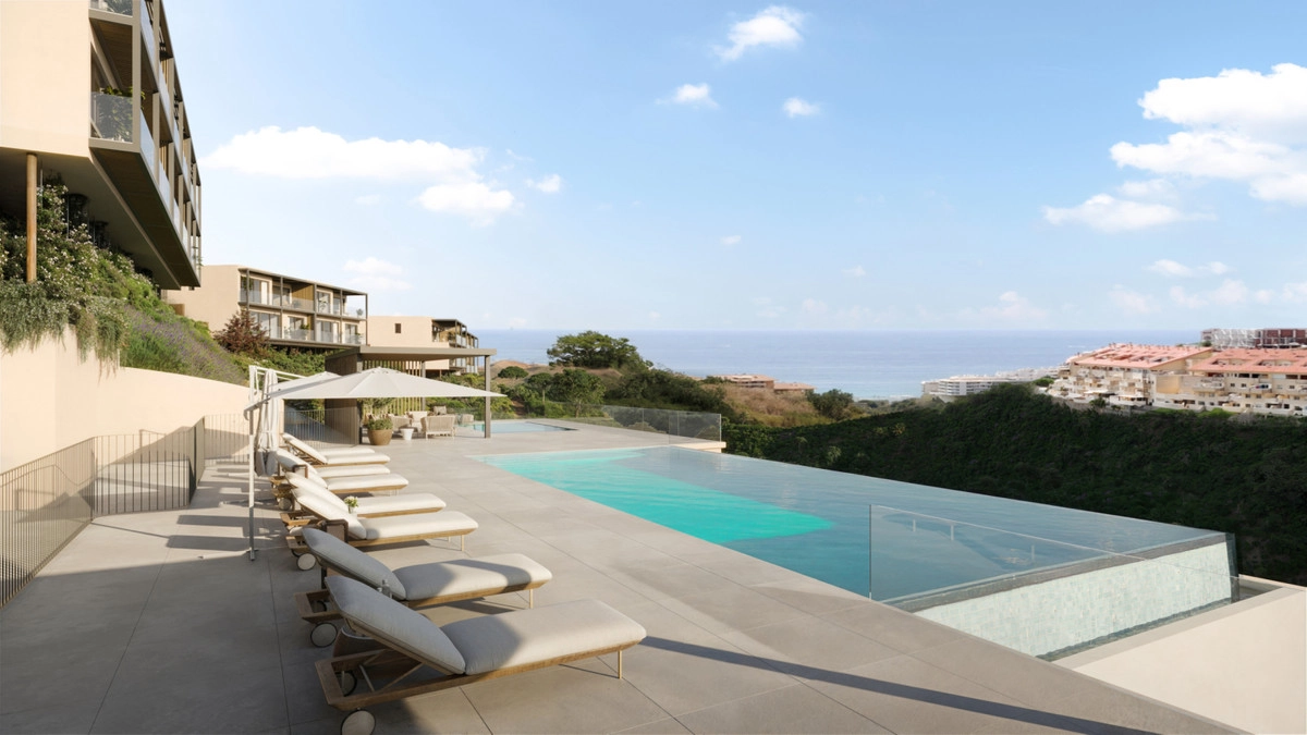 A tranquil sunbathing deck next to the infinity pool, overlooking the Costa del Sol.