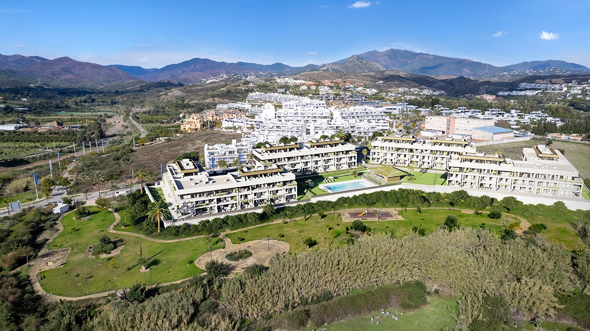 An aerial view showcasing the development's modern architecture and integration with the natural surroundings.