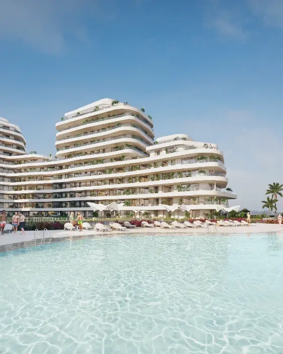 The expansive communal infinity pool area provides a beautiful setting for relaxation and leisure.