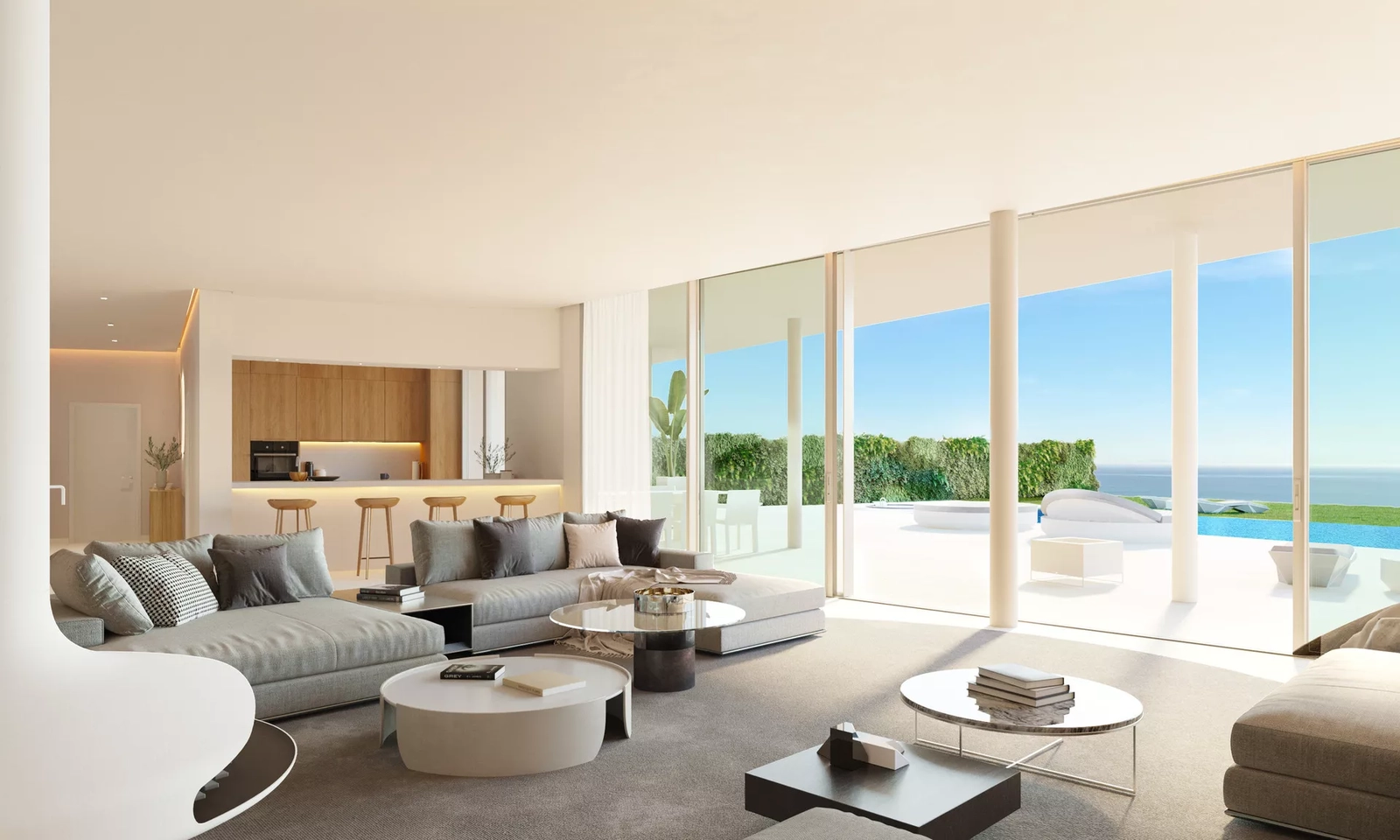 Floor-to-ceiling windows connect the living space with the terrace, offering seamless indoor-outdoor living and stunning Mediterranean sea views.