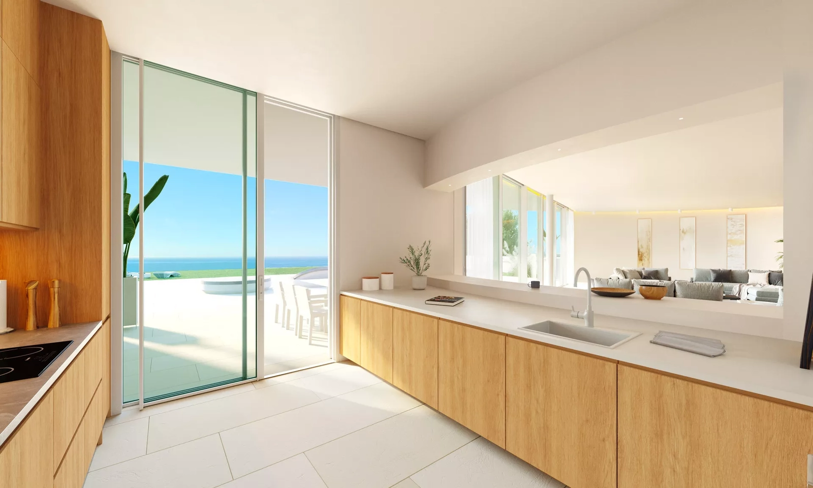 A modern, fully equipped kitchen with clean lines and natural materials, connecting to the main living areas.