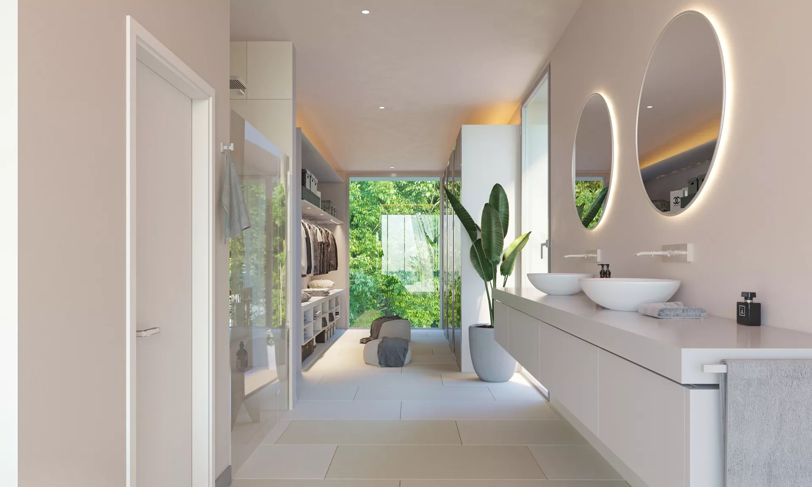 An elegant bathroom featuring high-quality fixtures, double vanities, and views of the surrounding nature.