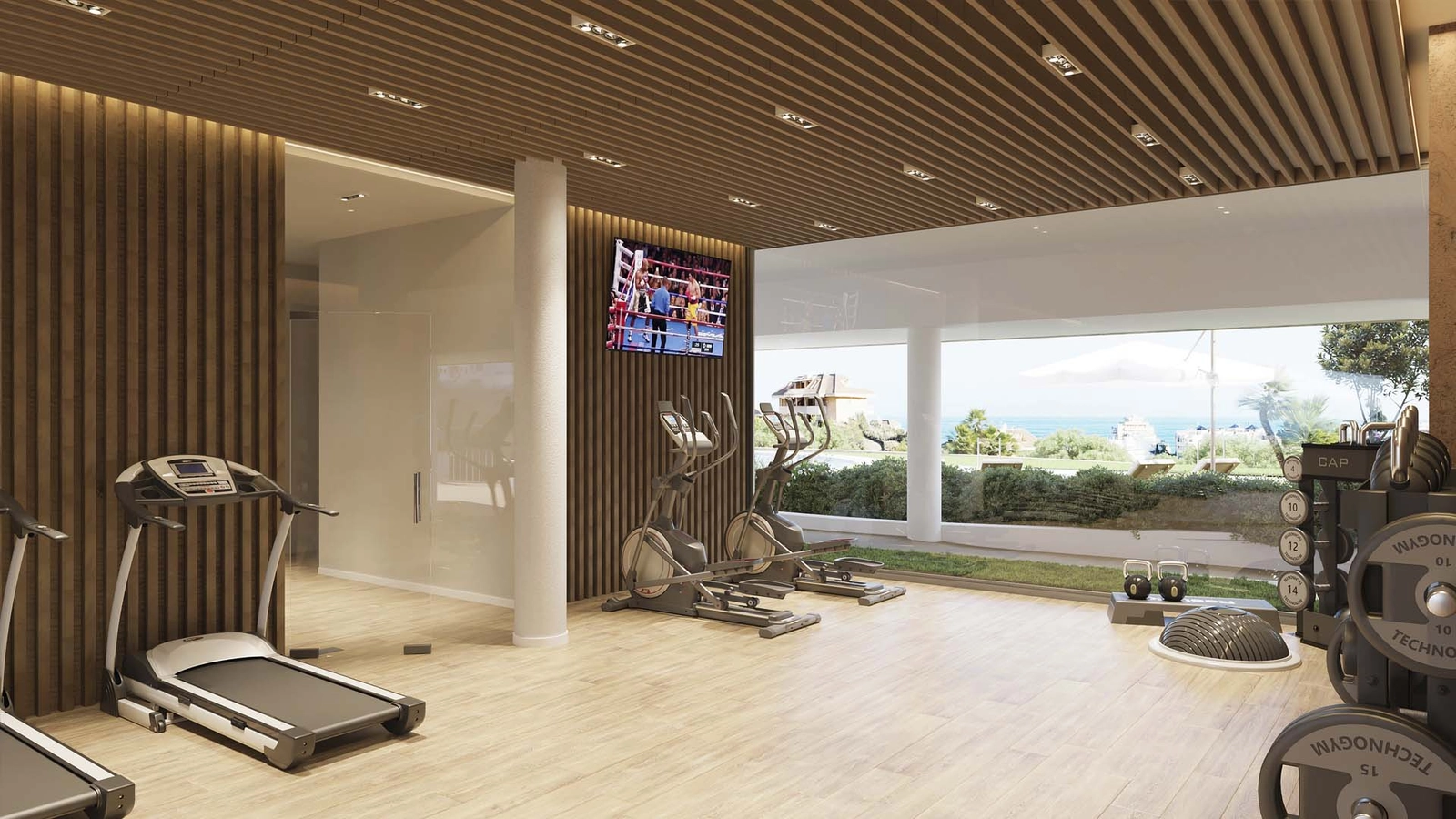 A state-of-the-art gym with garden views to inspire your personal fitness routine.