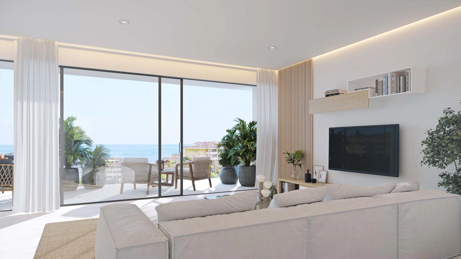 Bright living spaces seamlessly connect the indoors with the beautiful coastal scenery outside.