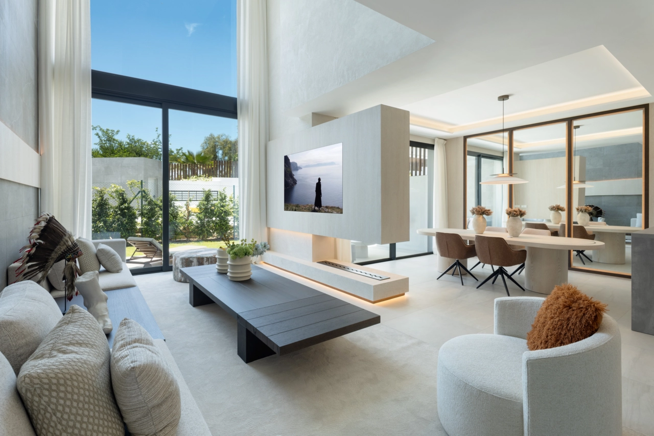 An open-plan design connects the living and dining spaces, ideal for modern family life and entertaining.