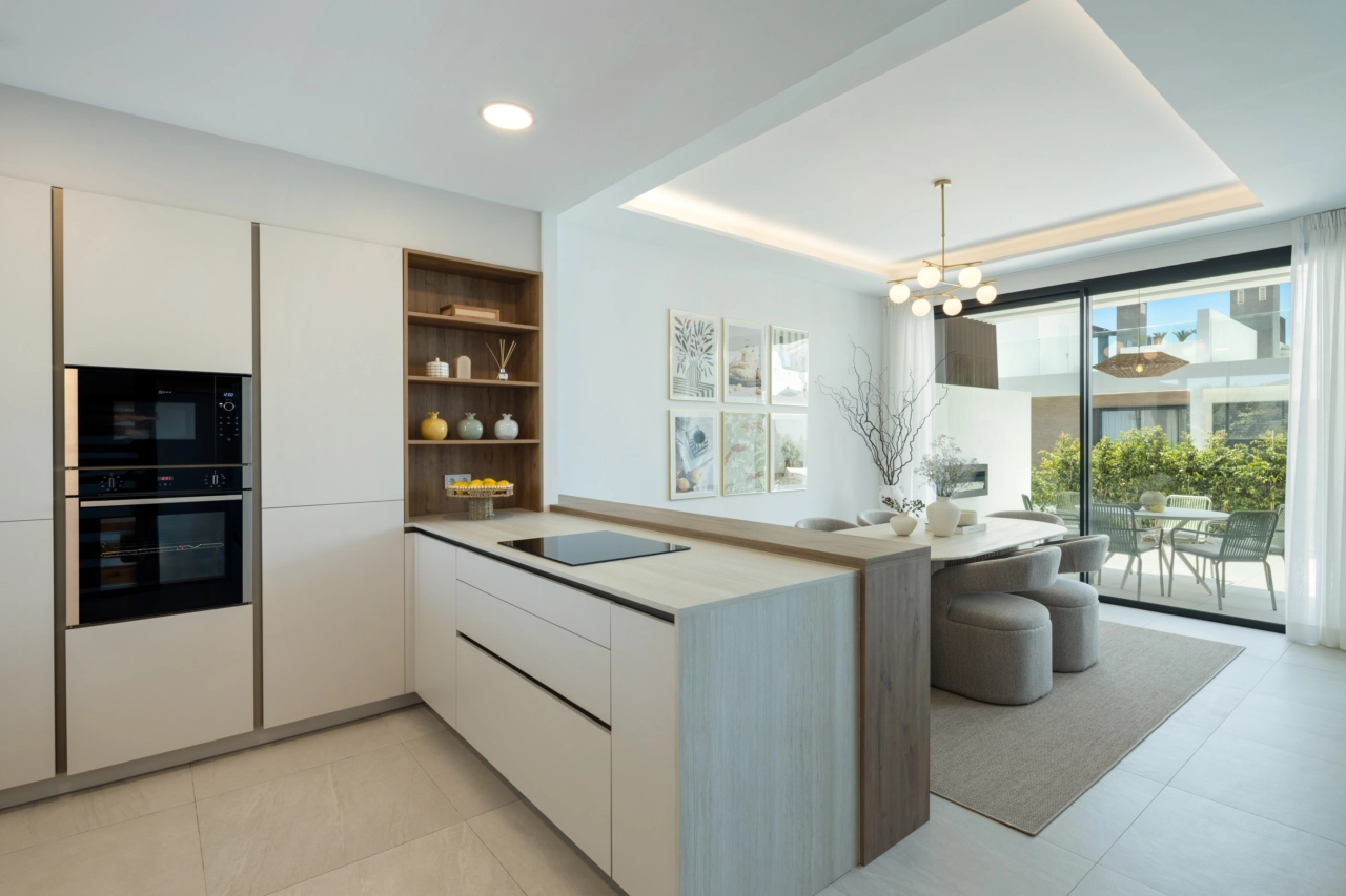 The state-of-the-art kitchen is equipped with high-end appliances and designed for both function and style.