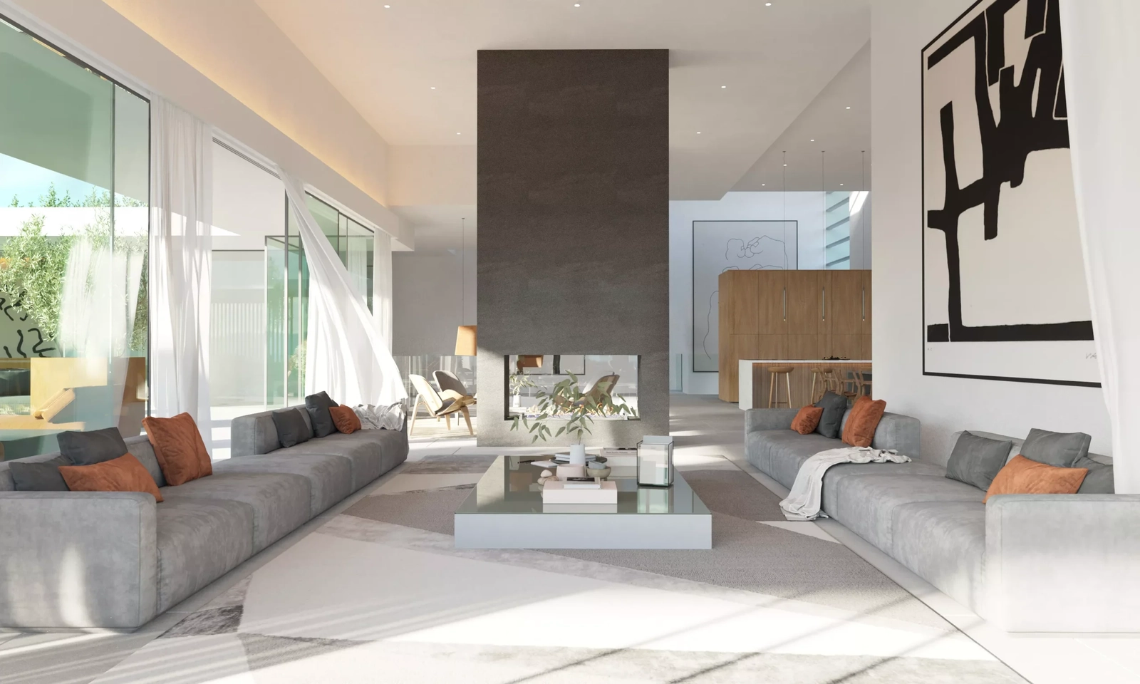 A central double-sided fireplace creates a warm and inviting atmosphere in the open-plan living space.