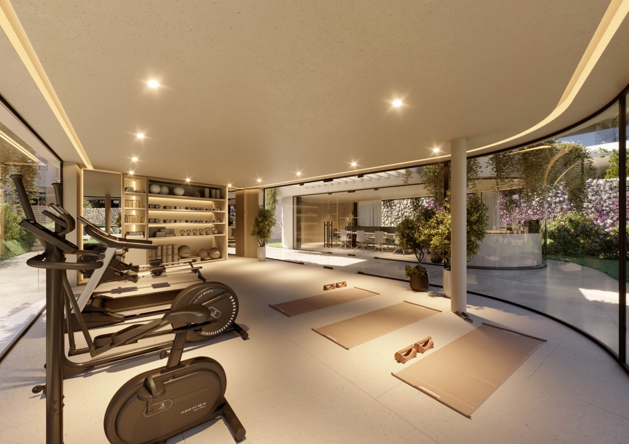 The fully equipped gymnasium overlooks the gardens, allowing for a workout with beautiful, natural views.
