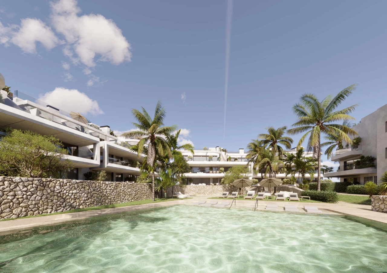 The inviting communal swimming pool is set within landscaped gardens, creating a private oasis for residents to enjoy.