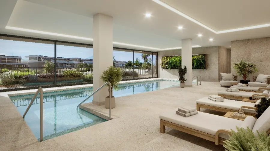 The indoor heated pool provides a perfect space for relaxation and wellness throughout the year.
