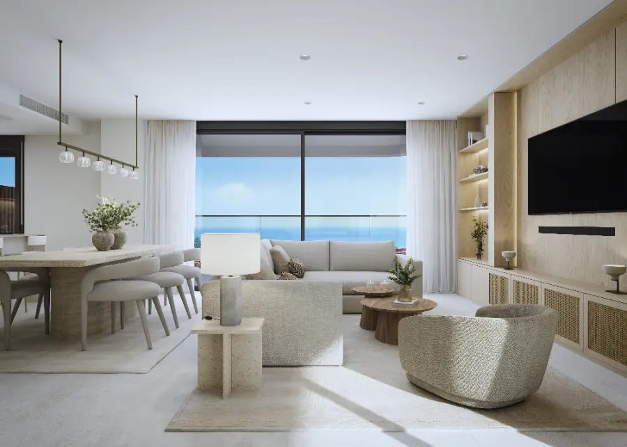The open-plan living and dining area is filled with natural light, creating a bright and welcoming atmosphere.