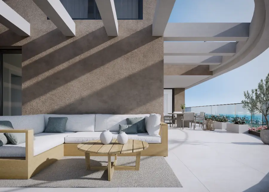A generous private terrace, designed for seamless indoor-outdoor living and dining in the Mediterranean sun.
