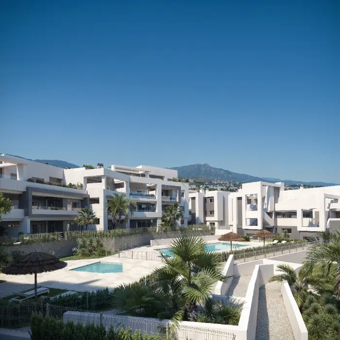 Contemporary architecture blends harmoniously with the lush, natural surroundings.