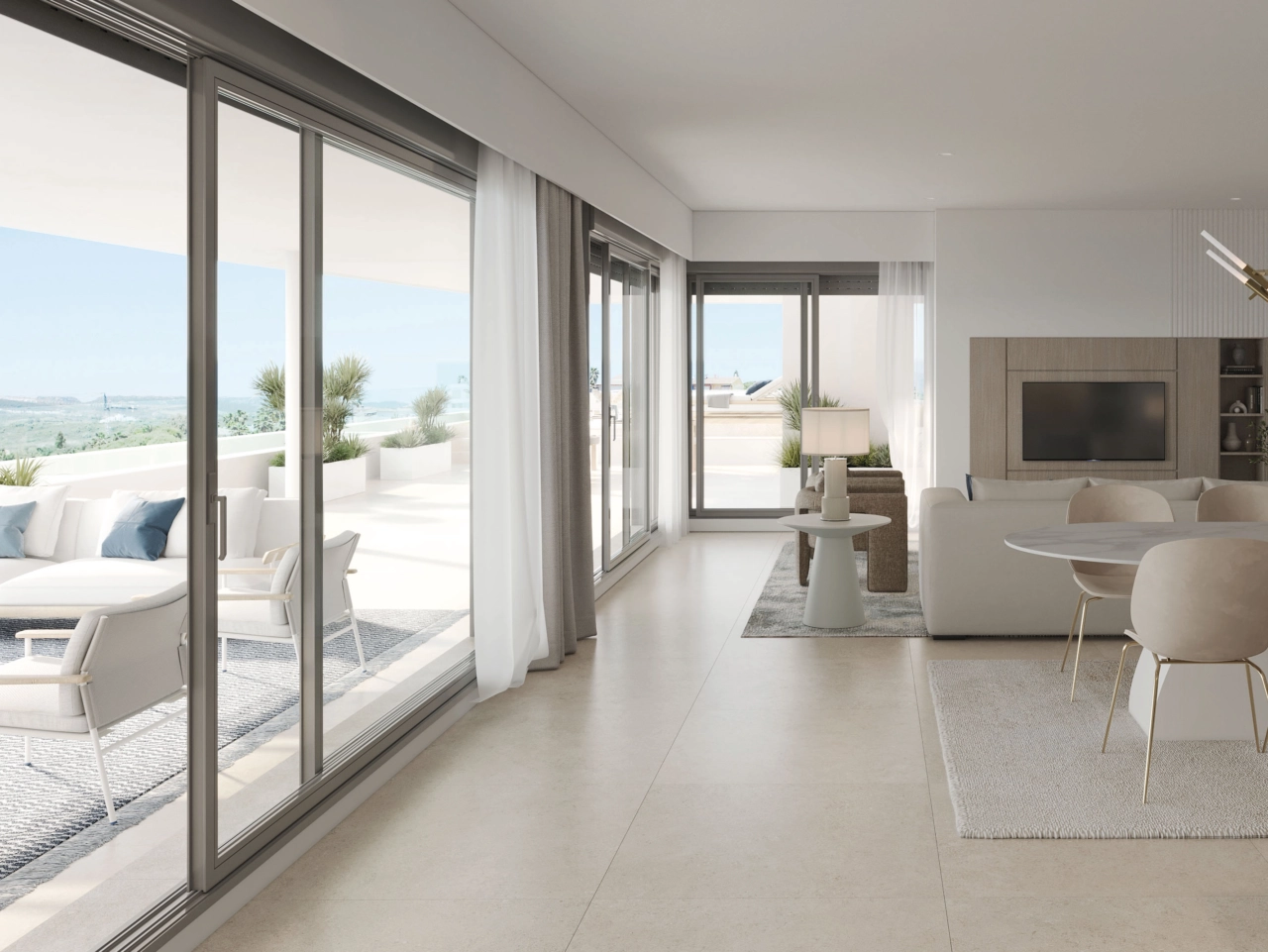 A bright and spacious living area, seamlessly connected to the outdoor terrace.