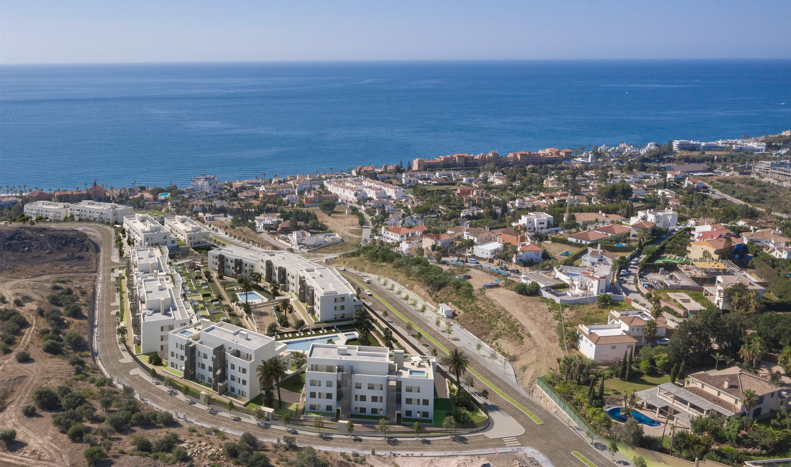 An aerial perspective of the development, showing its superb location near the Mediterranean Sea on the Costa del Sol.