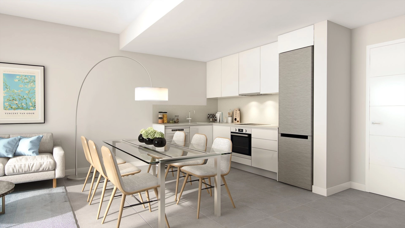 Una cocina moderna y totalmente equipada se integra perfectamente con el comedor, creando un corazón social y funcional en el hogar.