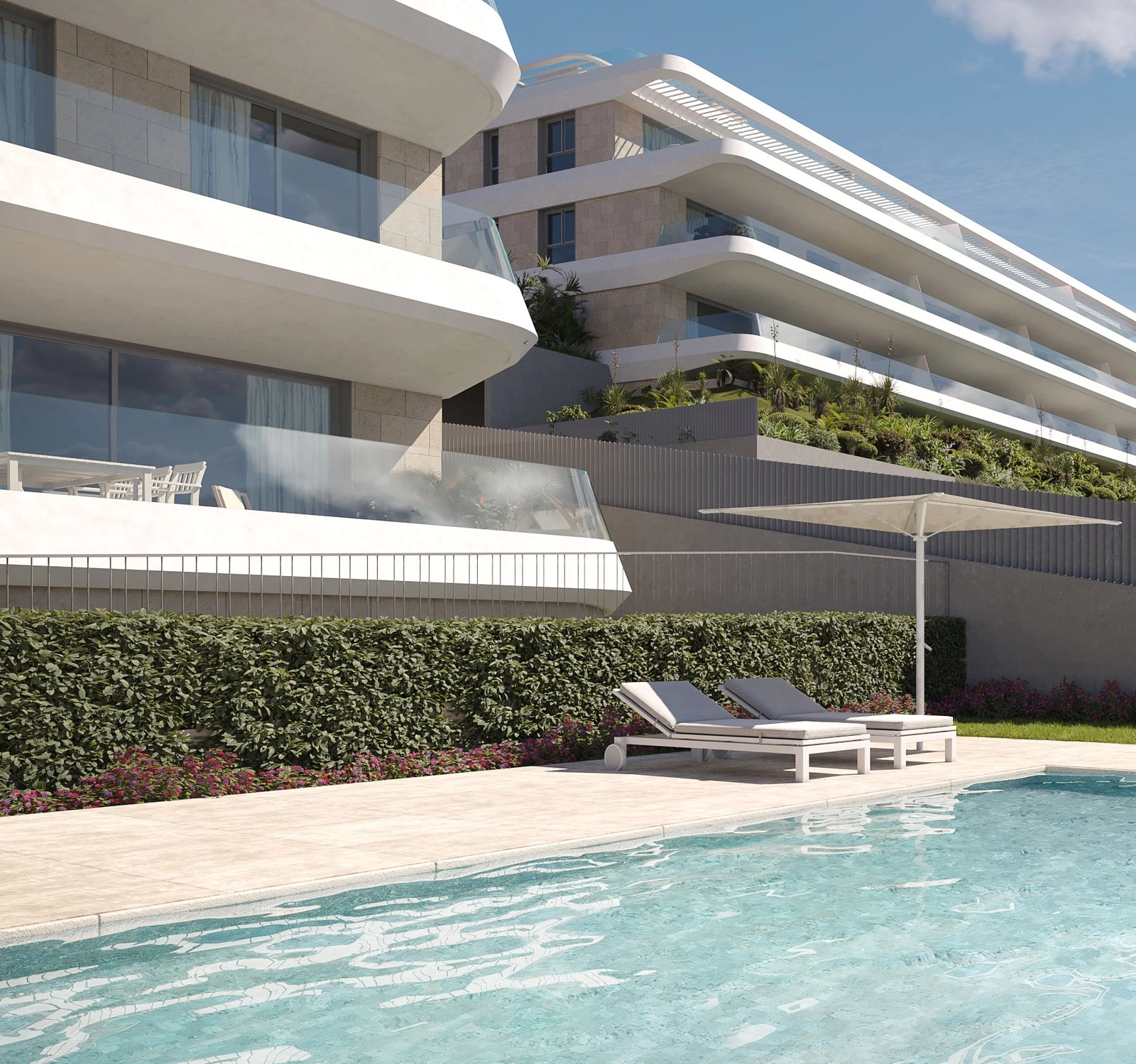 Disfrute de días de ocio en la piscina comunitaria, rodeada de exuberante vegetación y diseño arquitectónico moderno.