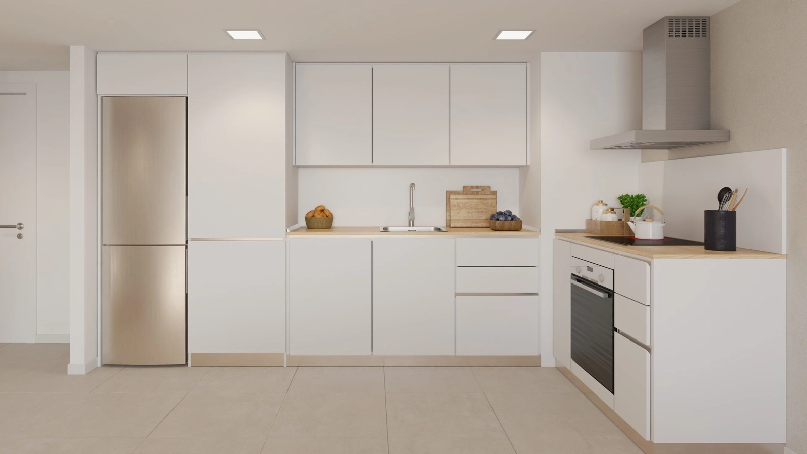 Cocina moderna totalmente equipada con electrodomésticos de alta calidad y líneas limpias y contemporáneas.