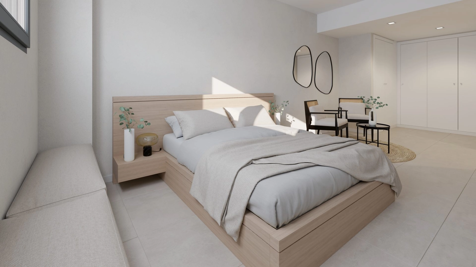 El tranquilo dormitorio principal, un remanso de paz con un diseño sereno y moderno.