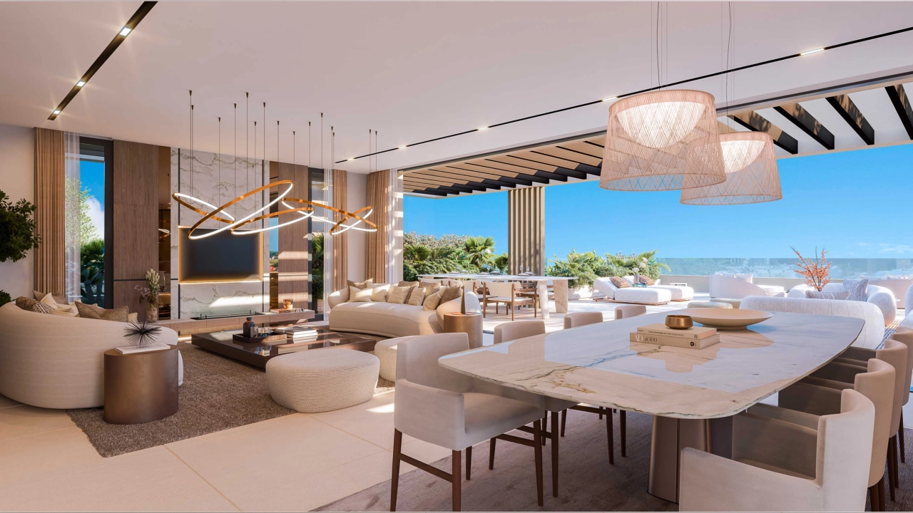 Una elegante zona de salón y comedor de planta abierta diseñada para el confort y llena de luz natural.