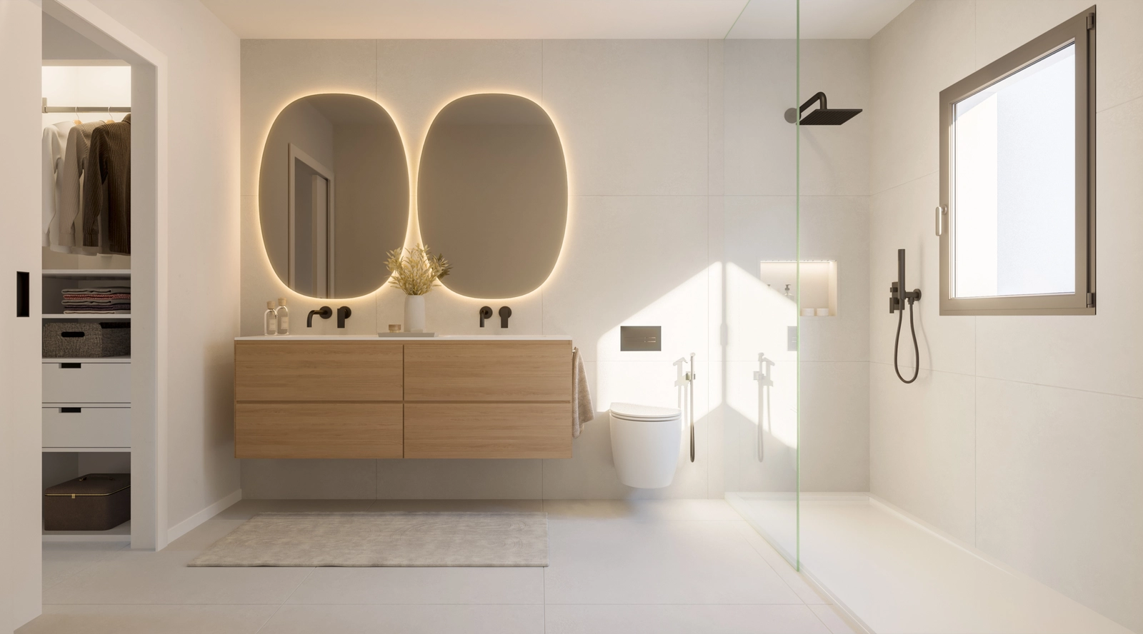 Un luminoso y moderno cuarto de baño con acabados de alta calidad y una amplia ducha a ras de suelo.