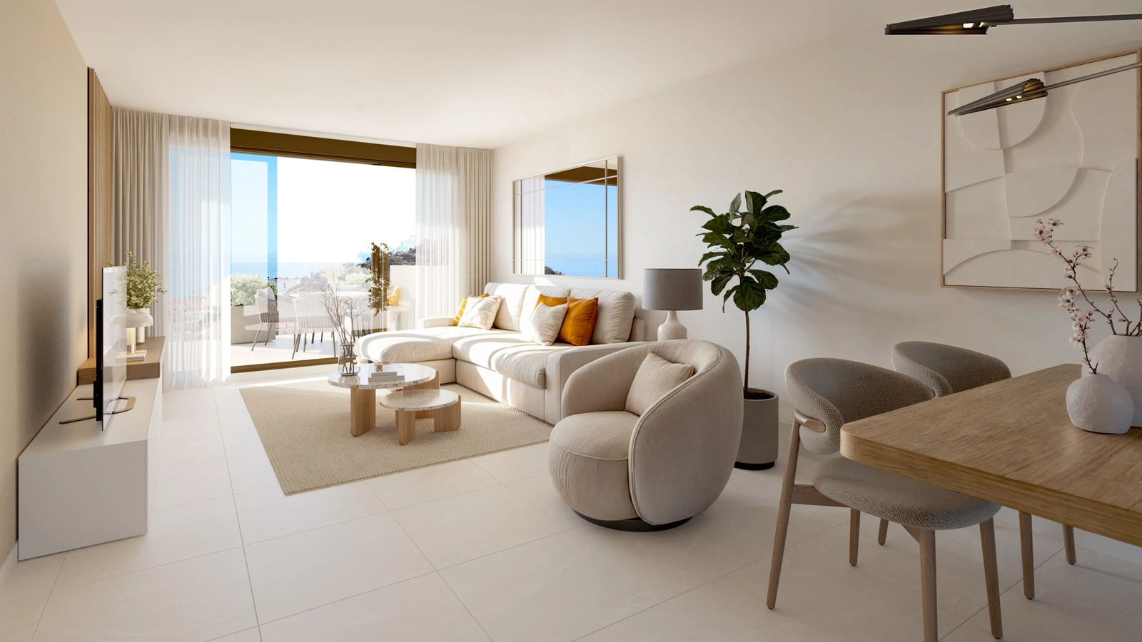 El luminoso y amplio salón conecta a la perfección con la terraza exterior, creando una transición ideal entre el interior y el exterior.