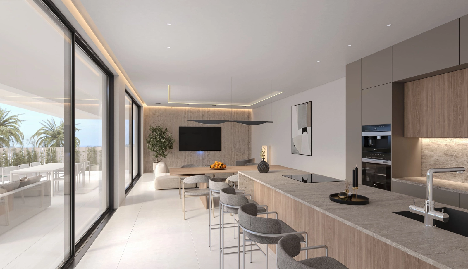 Una cocina moderna y totalmente equipada con una elegante isla es ideal para cocinar y socializar.