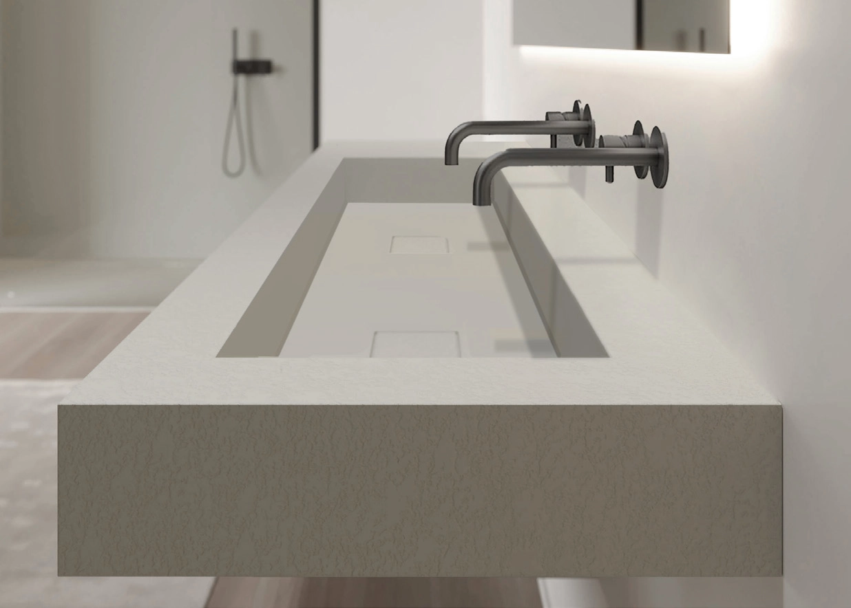 El cuarto de baño principal cuenta con un moderno lavabo doble y acabados de alta calidad.