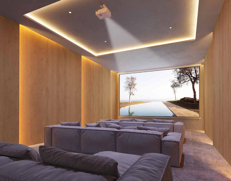 Disfrute de una noche de cine en la comodidad de su propia sala de cine de estilo vanguardista.