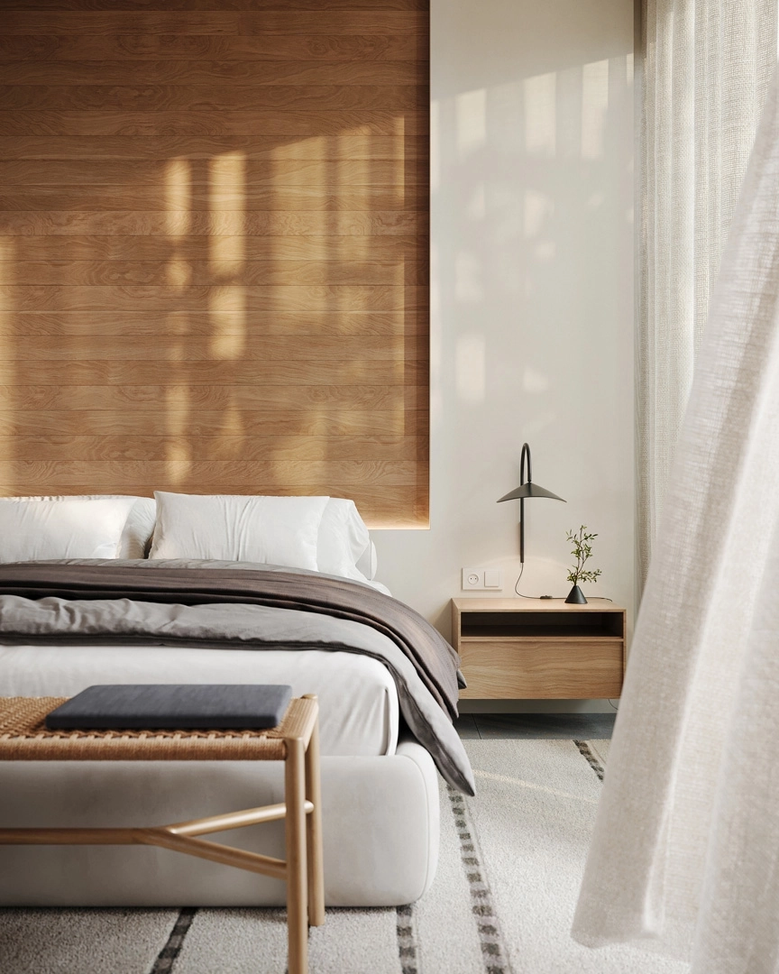 El dormitorio principal es un remanso de paz, con materiales naturales y grandes ventanales para recibir la luz de la mañana.